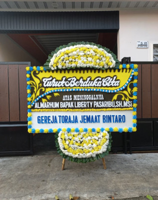 Papan Bunga Duka di Tolinggula